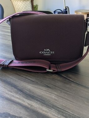 COACH Pebbled Leather Crossbody Bag in Burgundy with Pink Strap